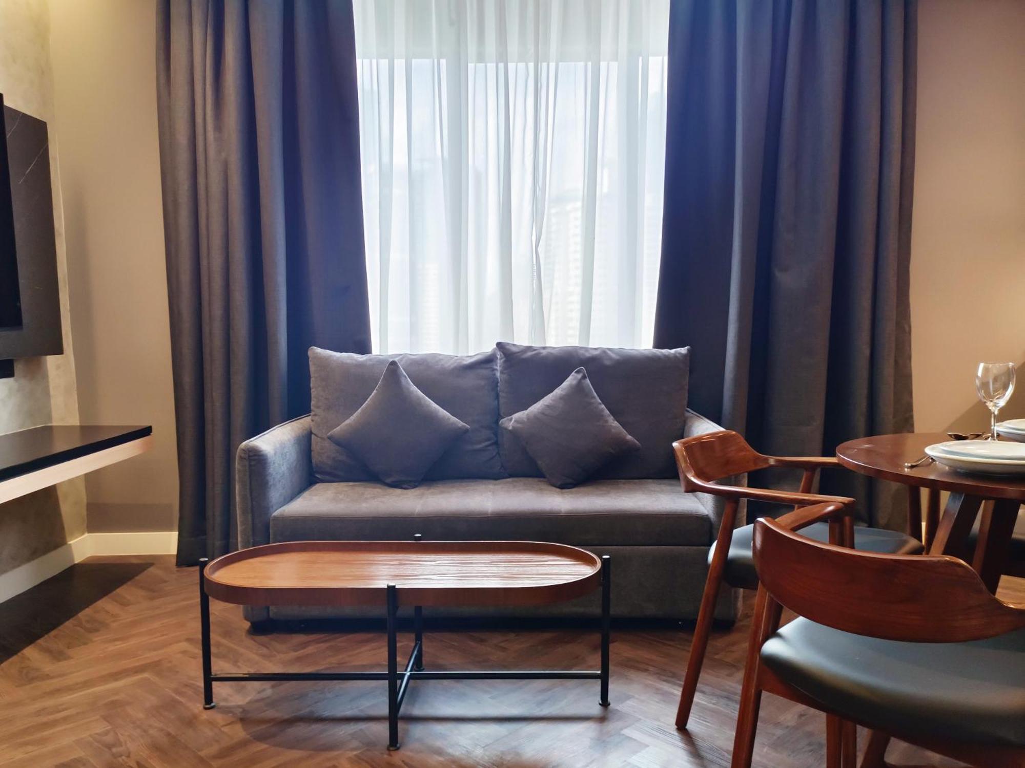 Hotel Royal Signature Kuala Lumpur Exterior photo A living room in a serviced apartment in London