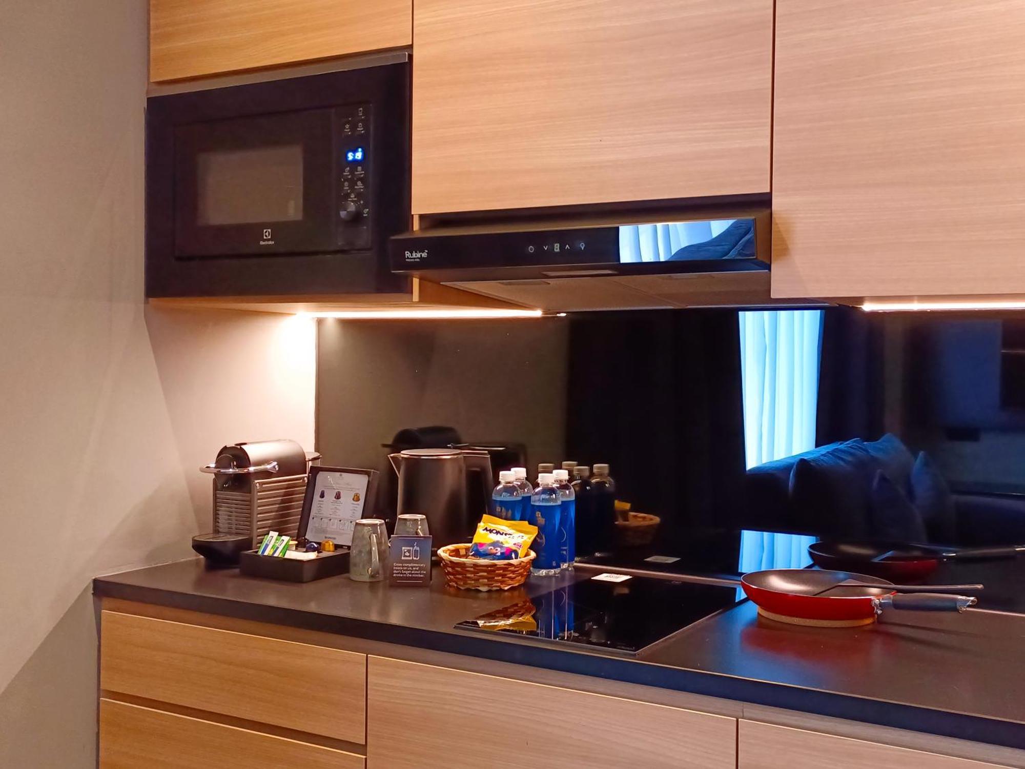 Hotel Royal Signature Kuala Lumpur Exterior photo A microwave oven in a kitchen