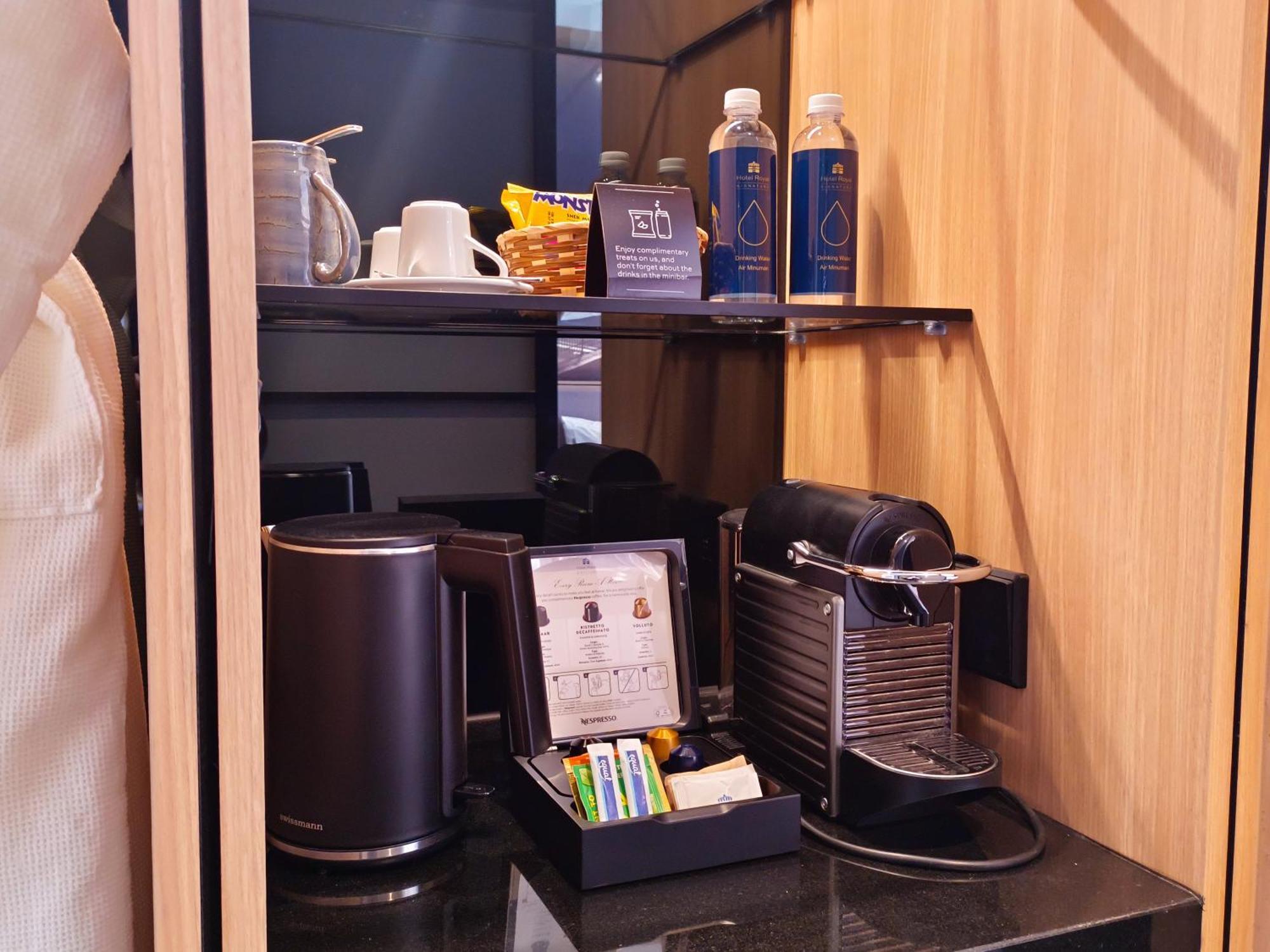 Hotel Royal Signature Kuala Lumpur Exterior photo A Nespresso coffee machine in a hotel room